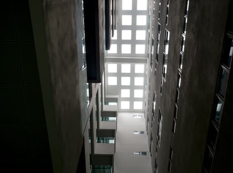 A Low vantage point in hall the high rise building, Looking up to the Daylight from the clerestory on the top of the building