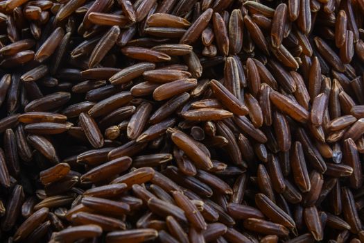 Raw brown rice is a beautiful background.