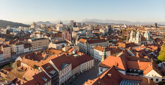 Panoramic view of Ljubljana, capital of Slovenia, at sunset. Empty streets of Slovenian capital during corona virus pandemic social distancing measures in 2020.