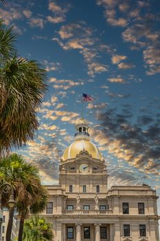 Classic old Savannah, Georgia City Hall with Gold Dome and American Flag