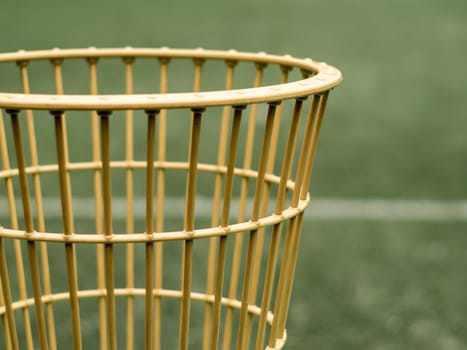 The basket of chairball game beside the field