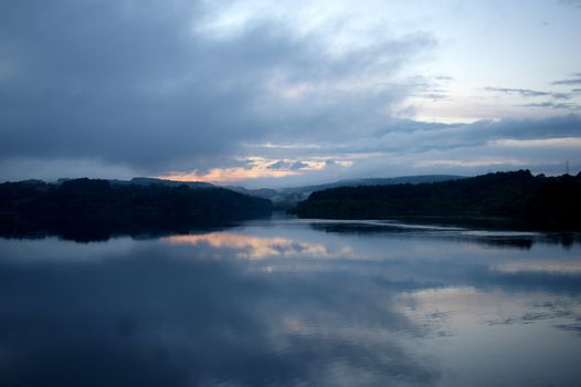 Sunset in the evening over Wayoh reservoir in Lancashire