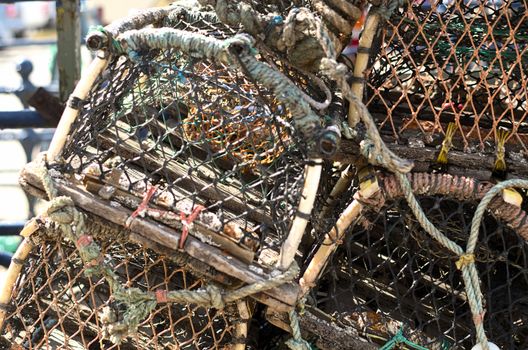 Lobster pots sitting in the bay of the pretty fishing village of Staithes in North Yorkshire