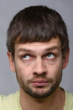 Closeup portrait of a pensive man of European appearance