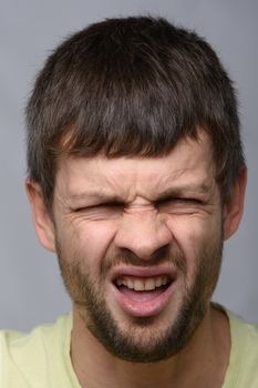 Portrait of a man who smelled, European appearance and close-up