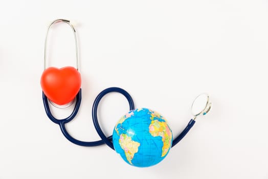 World health day concept, Stethoscope, globe and red heart on white background with copy space. Global health care