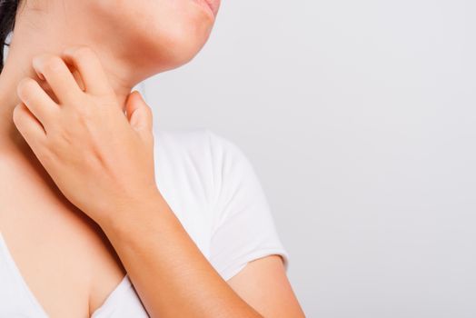 Asian beautiful woman itching her useing hand scratch itch neck on white background with copy space, Medical and Healthcare concept