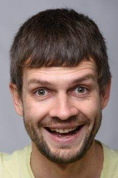 Close-up portrait of a very happy man