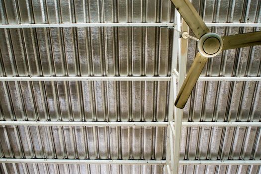 Electric ceiling fan under the metal sheet roof