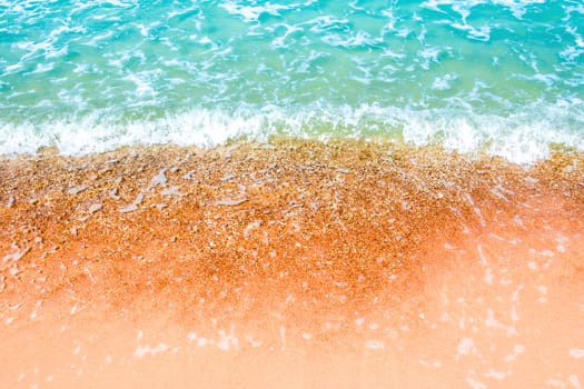 Bubble and clear water of sea and wave on the beach