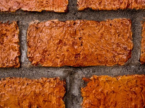 The wall made from Red solid bricks