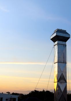 Sunset sky in twilight background of factory chimney