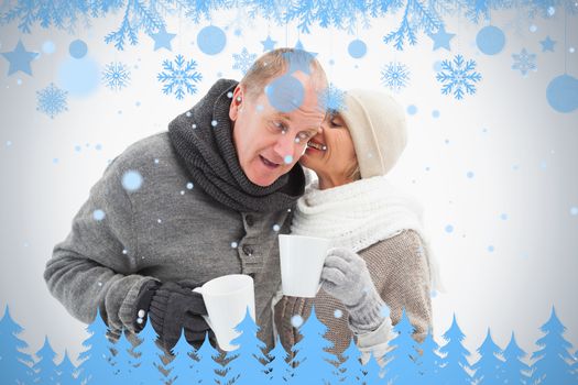 Happy mature couple in winter clothes holding mugs against snow flake frame in blue