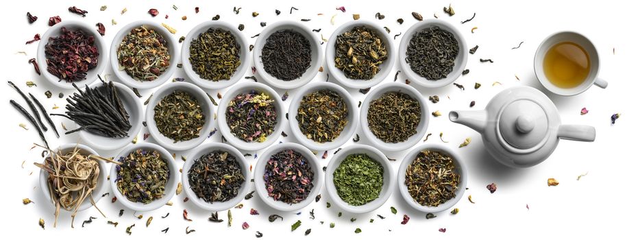 Large assortment of tea on a white background. The view from the top.