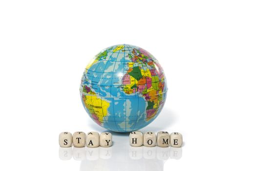 stay home due to coronavirus around the world with a house on white background