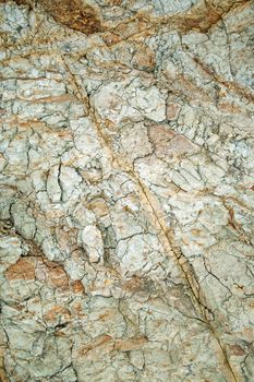 Rough clay rock and dirt under ground texture, Earth brown dry mud pattern background vertical