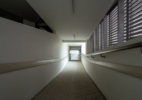 Light at the exit of the corridor in the building