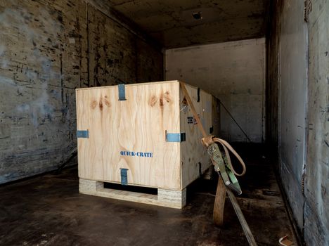 Radioactive material label beside the transportation wooden box Type A standard package in the truck