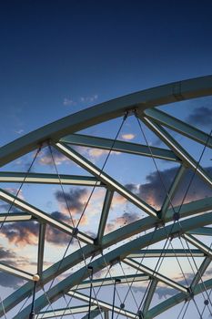 Curved steel beams on a bridge over the Platte River in Denver