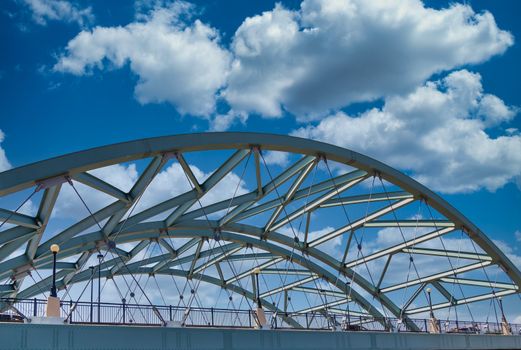 White curved architectural detail against a blue sky