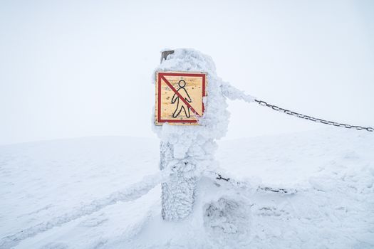 No trespassing sign warning tourists to keep them safe in Krkonose national park.