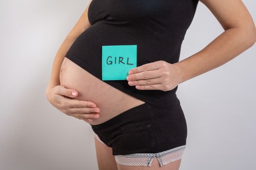 pregnant woman waiting for a boy or girl.