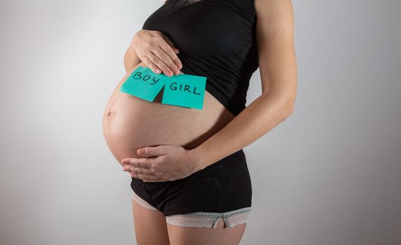 pregnant woman waiting for a boy or girl.