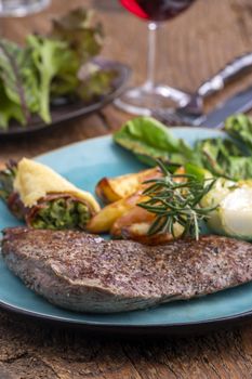 steak on a plate with vegetables