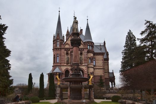 Konigswinter, Germany - 2 March 2019: Drachenburg castle on a gloomy day