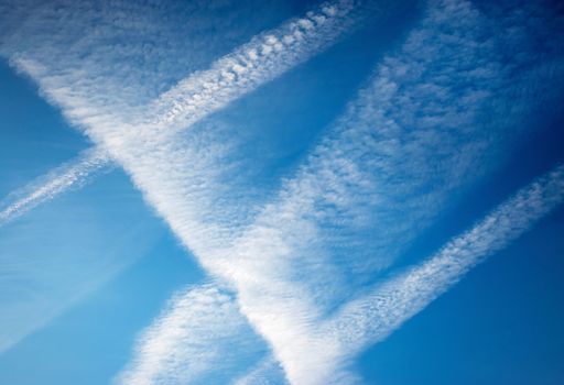 abstract background Smudges of Chemtrail in the blue sky