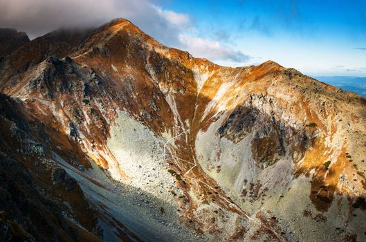 seasonal landscape background winding rocky footpath into the valley