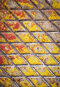 abstract background or texture Detail of a yellow painted iron hatch