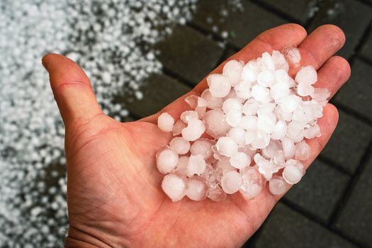 seasonal background ice hail on hand