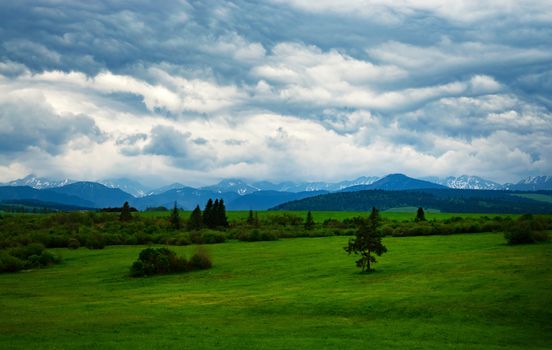 nature seasonal background gloomy submontane landscape with clouds