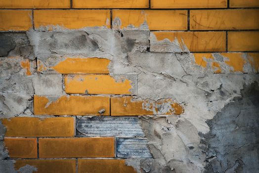 background or texture old tiling with ocher tile with mortar