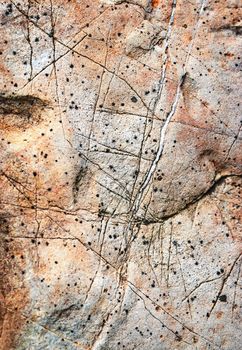 background or texture detail of abstract lines on old limestone rock