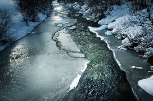 seasonal landscape background winter scene with a frozen river