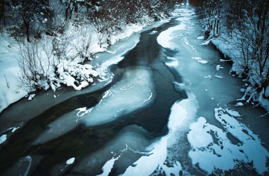 seasonal landscape background winter scene with a frozen river