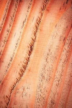 abstract background or texture oblique lines on red tinted wood