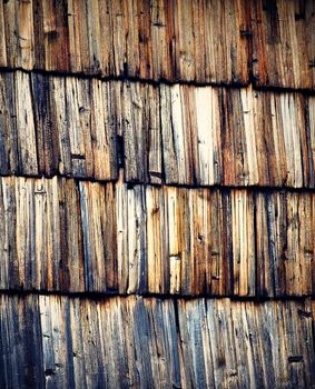 background or texture abstract cut of old wooden shingles