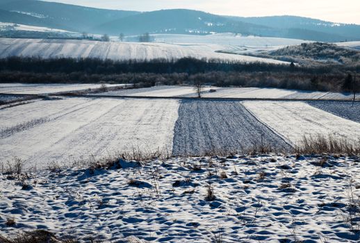 nature seasonal background snowy fields and landscape