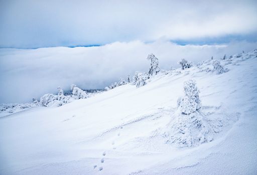 seasonal nature background mountain snow and frozen landscape