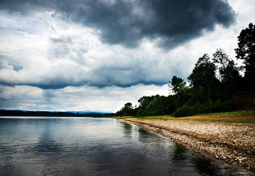 seasonal landscape background abandoned beach under clouds