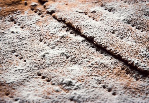 food background or texture the surface of the pie sprinkled with sugar