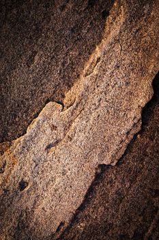 background or texture dark brown stone detail