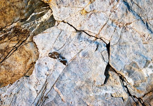 background or texture cracked structure on limestone rock