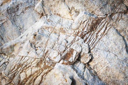 background or texture brown veins of quartz on white limestone