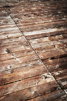 background or texture old wooden boards slant nailed