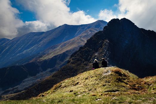 nature landscape background two figures in high mountains