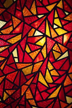 abstract background or texture detail of a mosaic with colored glasses